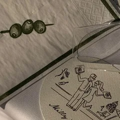 An illustrated coaster printed with a bespoke drawing