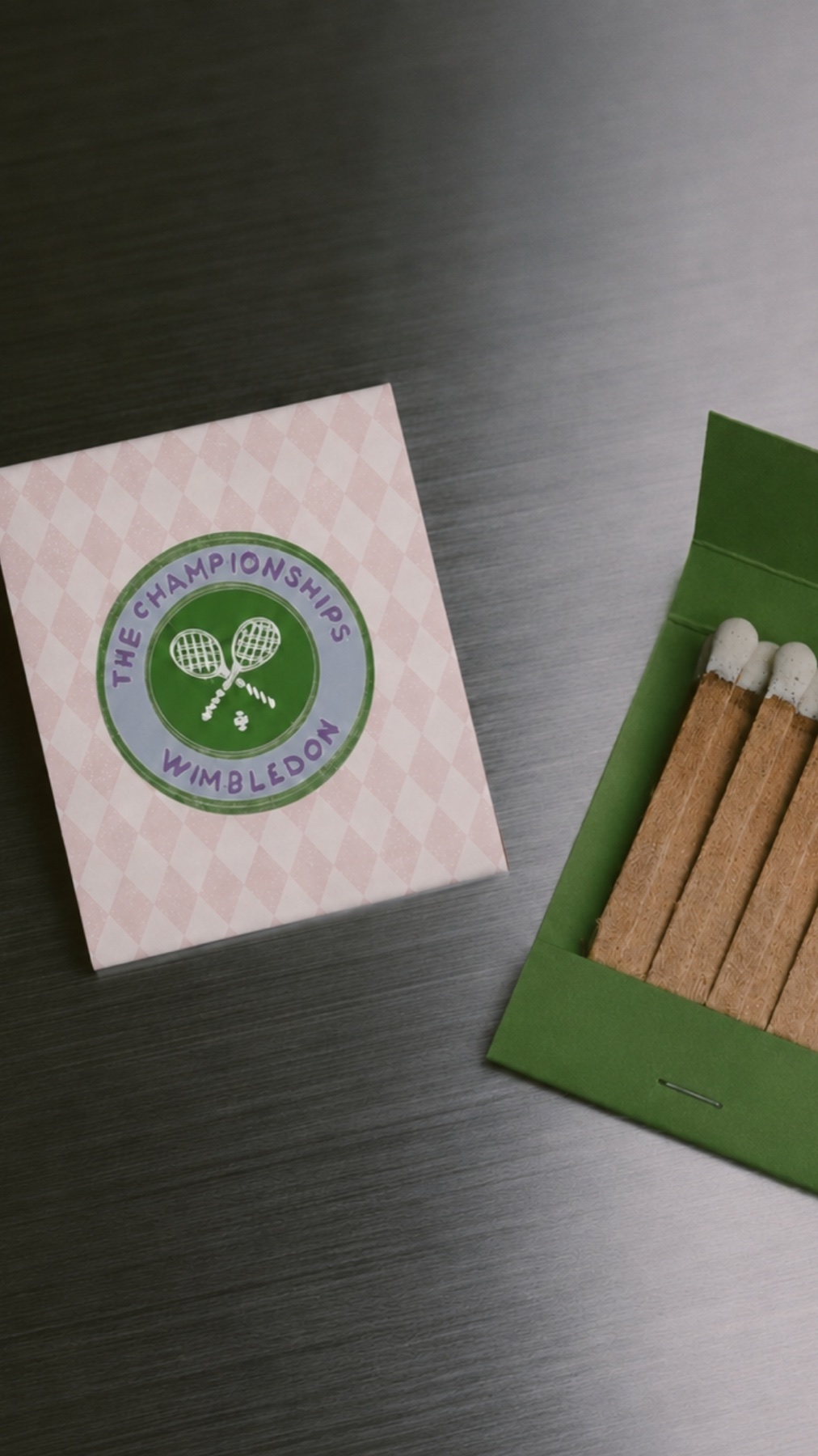A pink and green bespoke matchbook created for The Championships at Wimbledon