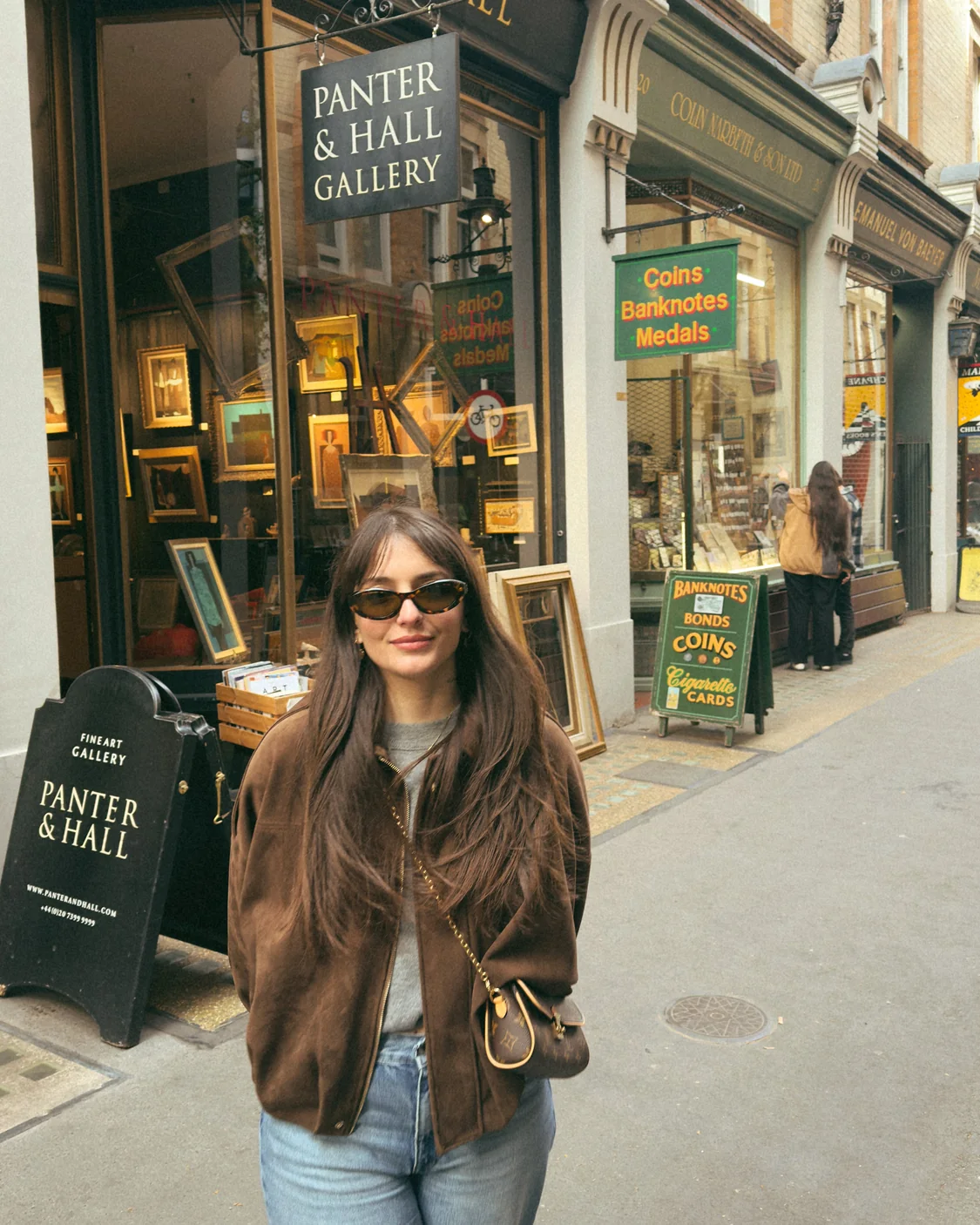 Miray outside a fine art gallery in London